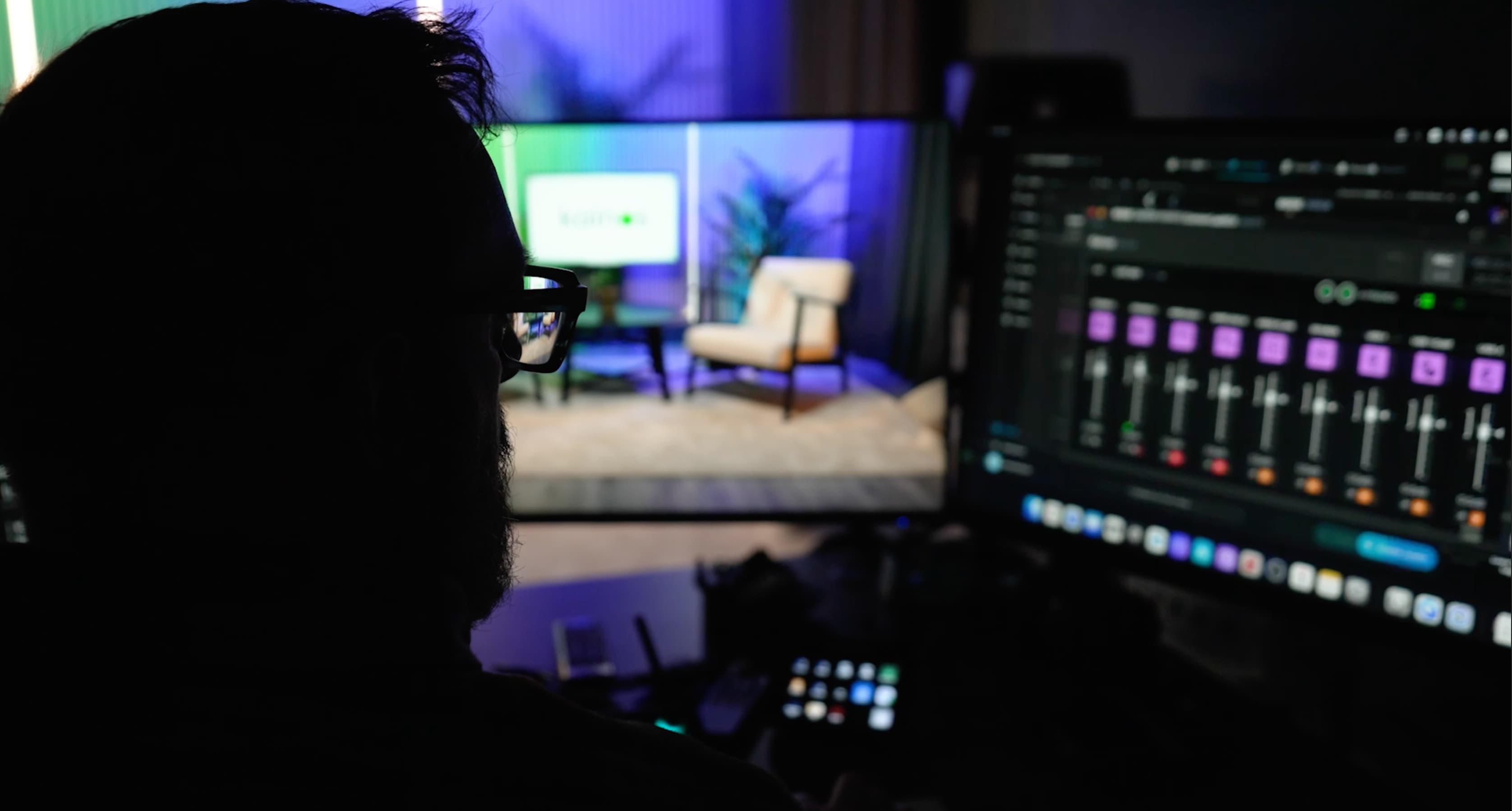 Behind the scenes — an operator at the studio mixing desk during a recording session